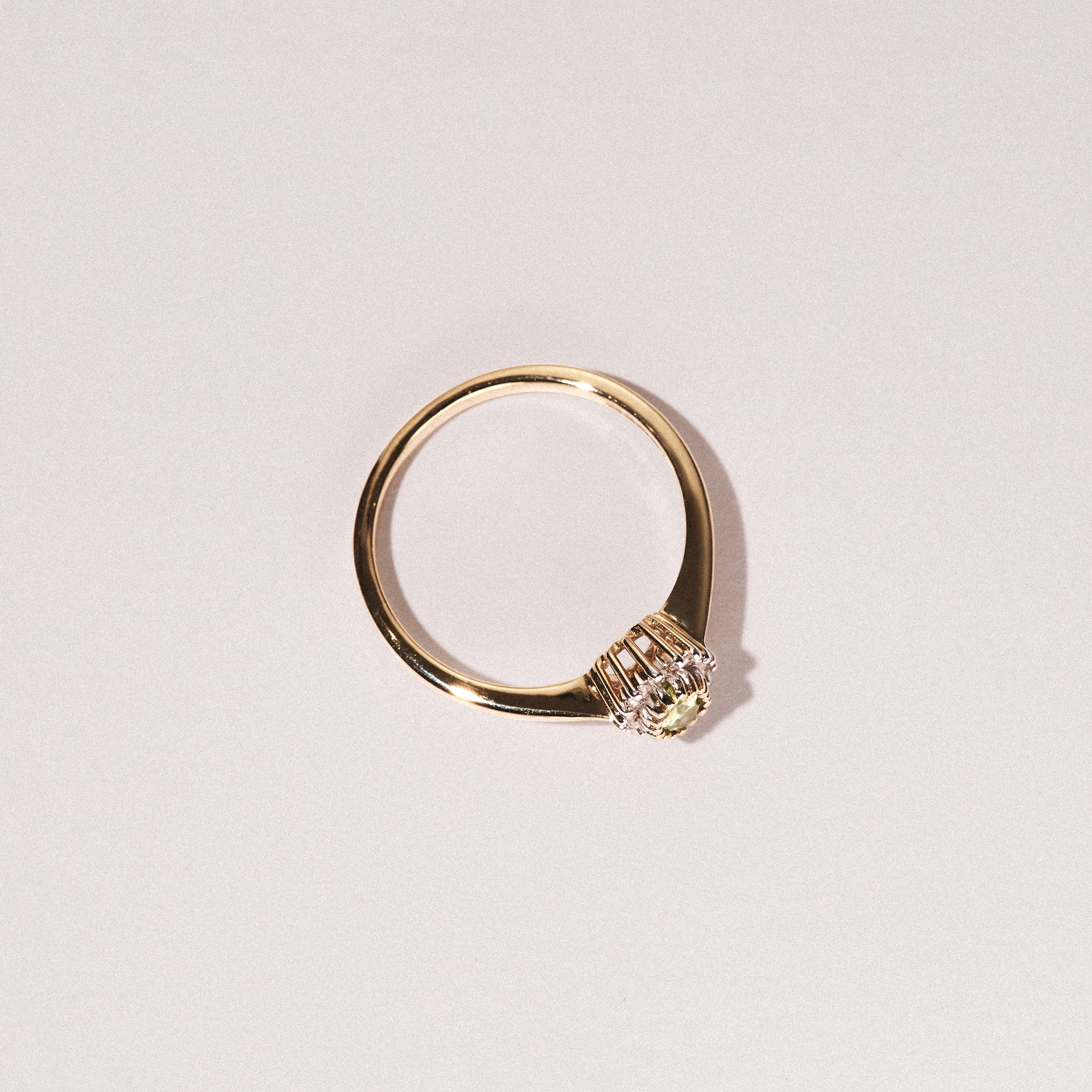 Peridot 6 x 4mm And Diamond 9K Yellow Gold Ring